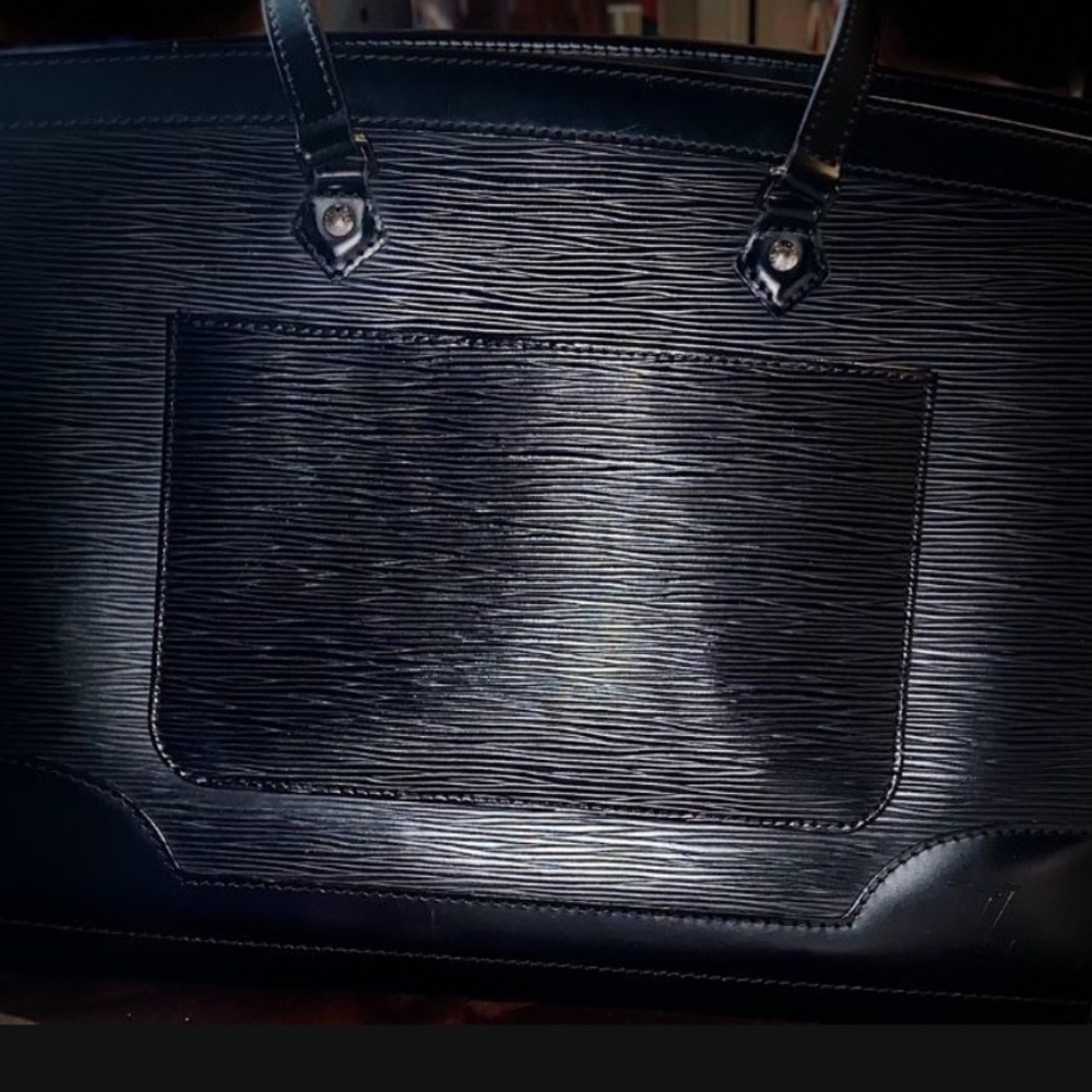 Authentic Louis Vuitton, black inside and out used no box